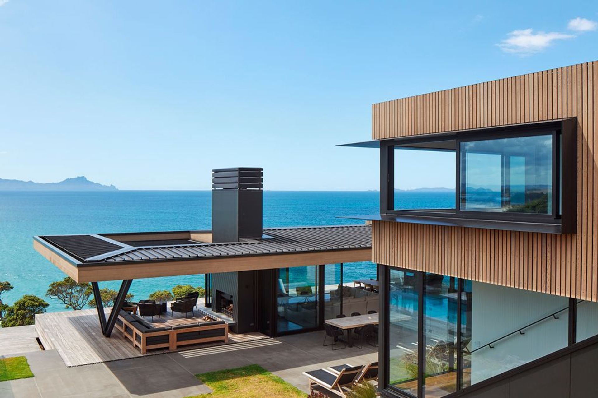 Retractable Opening Roof inserted to the roof line to provide controllable shelter when required. Photo credit: Simon Wilson