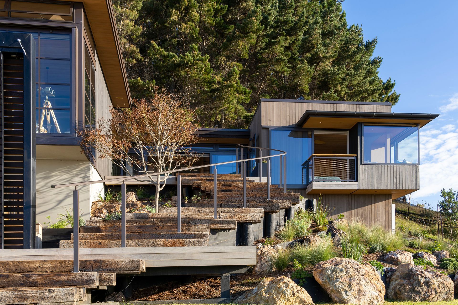 With no defined entrance, walkways connect to different sections of the home.