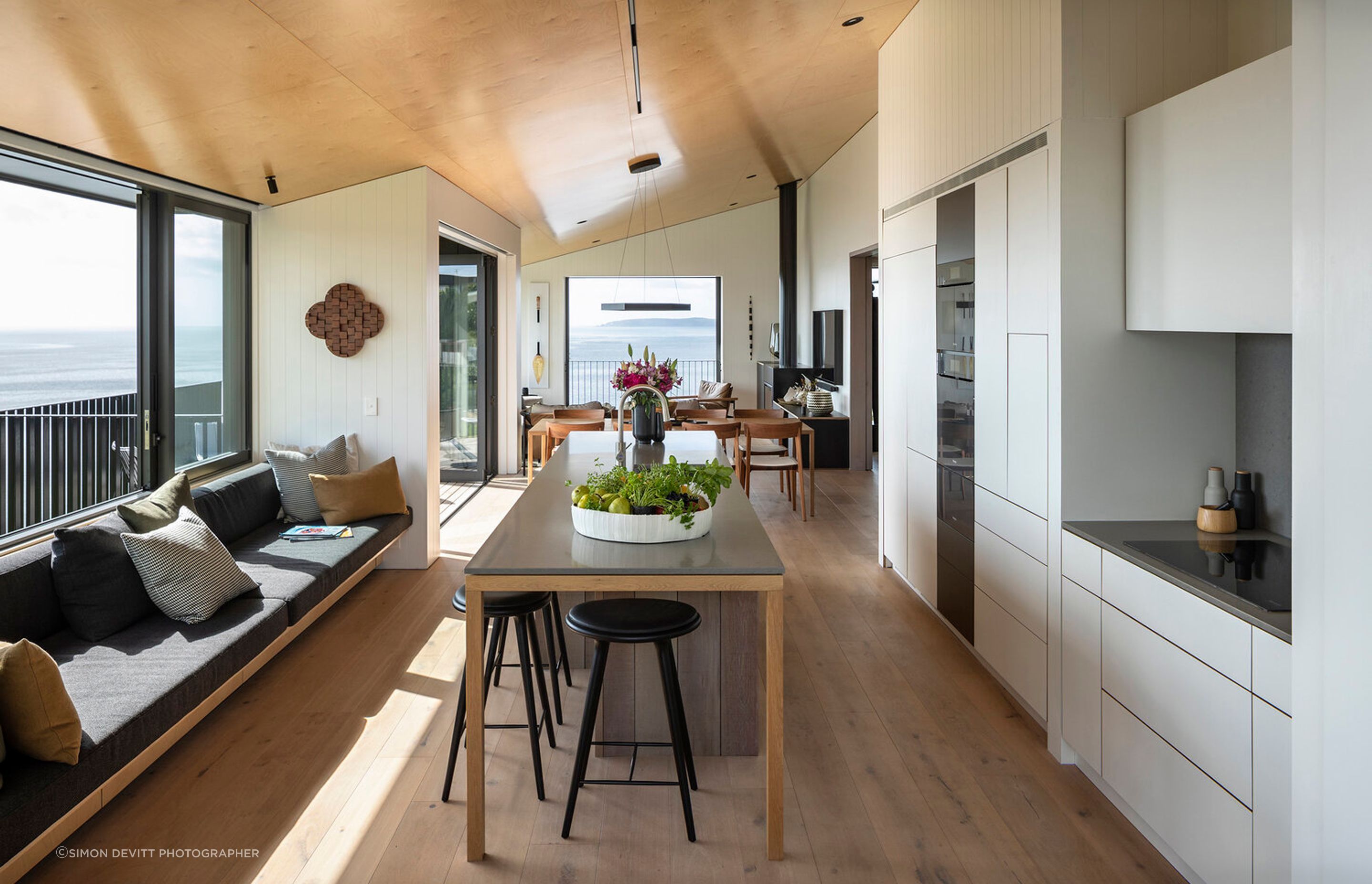 Running roughly north-south, the open-plan living area is bathed in natural light and enjoys ample cross ventilation thanks to the split cruciform design of the building.