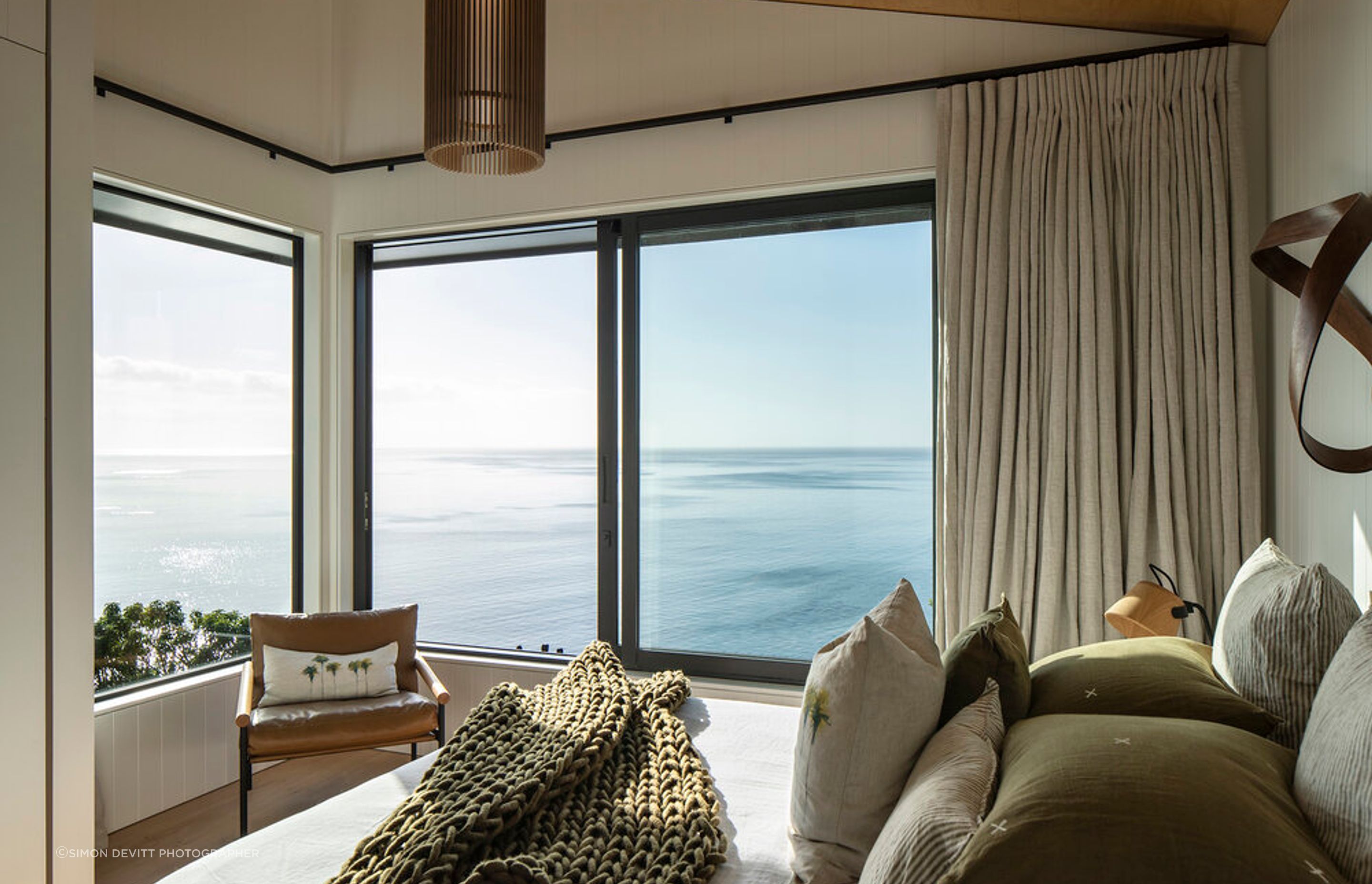 The main bedroom enjoys enviable views over Omaha Bay.