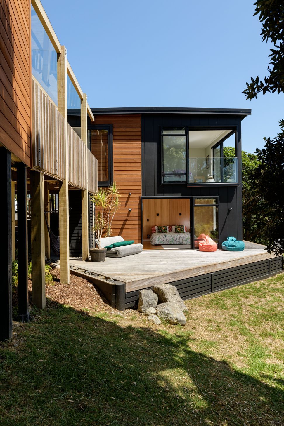 Multi-purpose room double a spare bedroom and extra living space, opens to a generous deck.