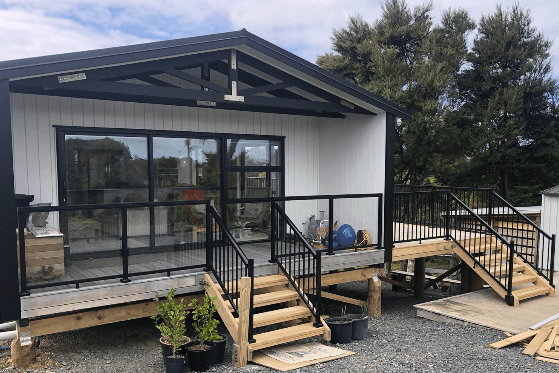 After being transported to site, the finishing touches for this home was additional side deck and handrails.