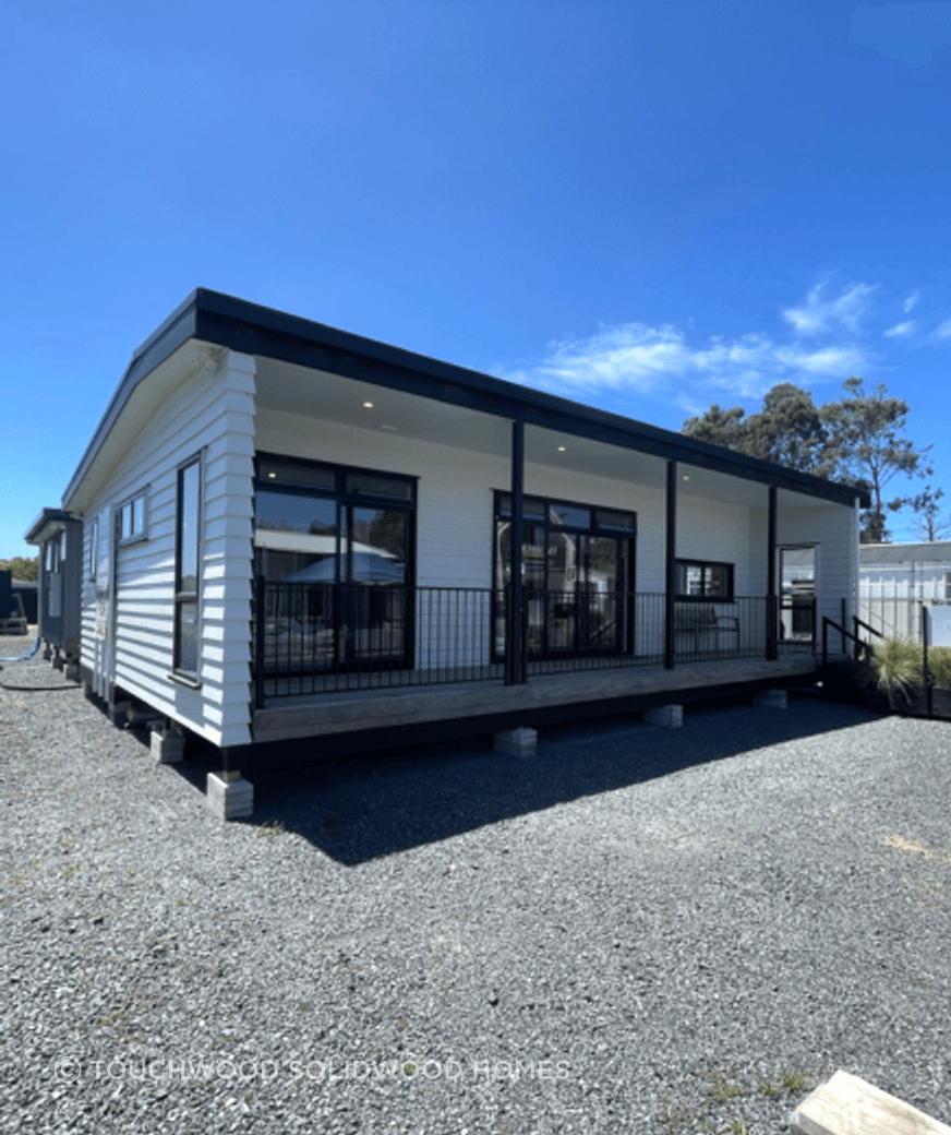 This design is a very popular show home due to the front deck and transportable design