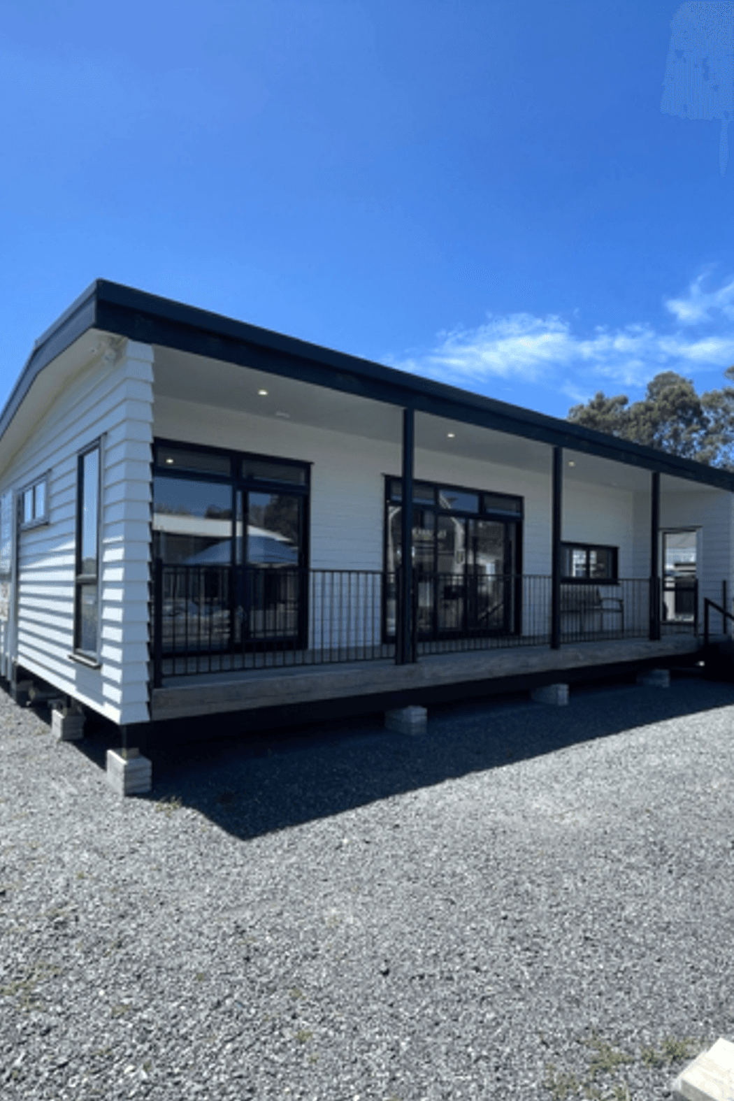 This design is a very popular show home due to the front deck and transportable design