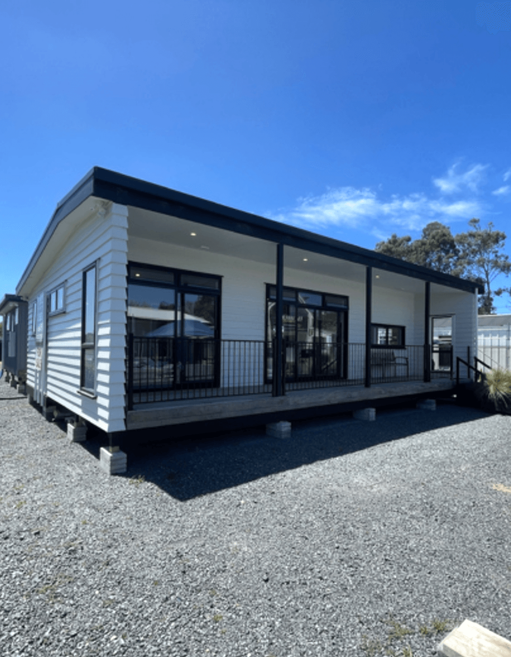 This design is a very popular show home due to the front deck and transportable design
