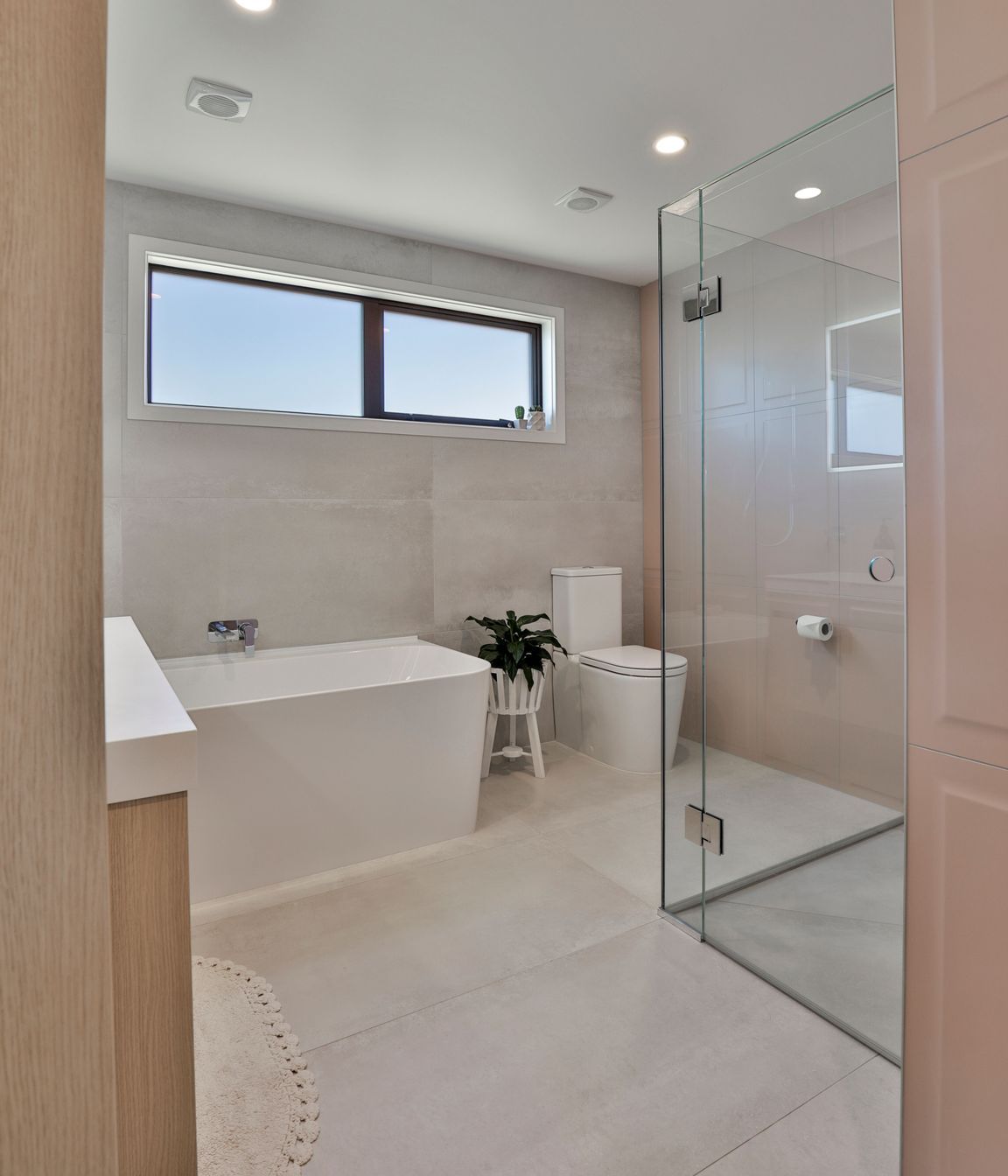 Bathroom: Ensuite: Ferrocemento Bianco 597x1196mm and Victoria Blush Smooth Panel 400x800mm