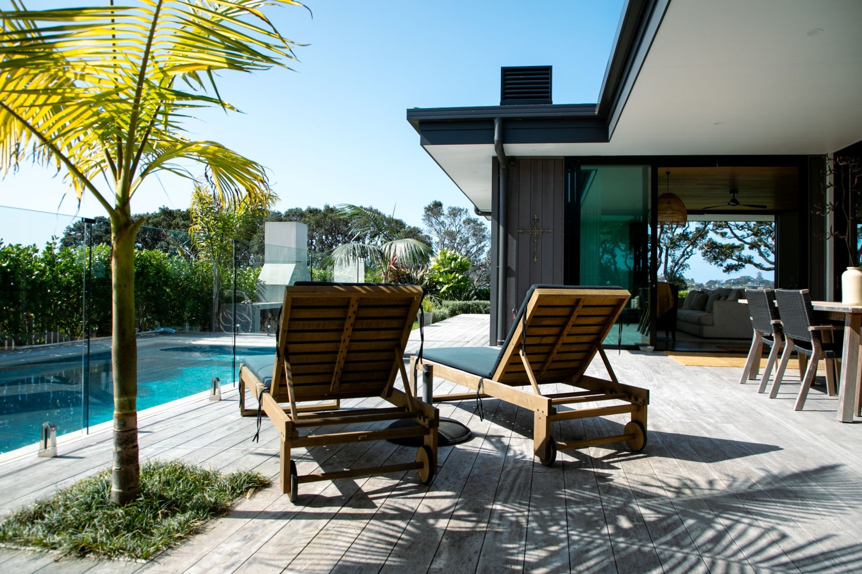 decking-with-blue-pool-outdoor-living-arcline-architecture-nz-design-palm-springs-2.jpg