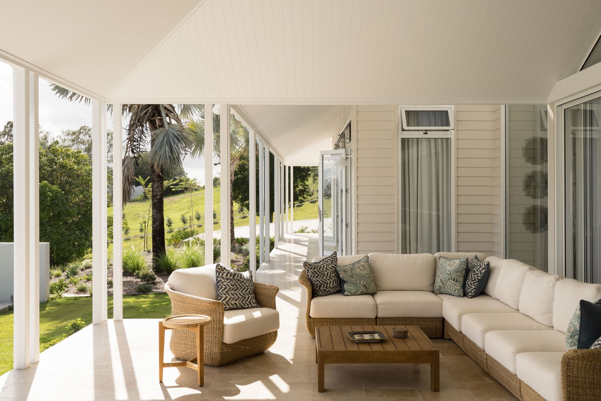 Euroa Farm - Patio. Verandah lounge with views over the garden and hills.
