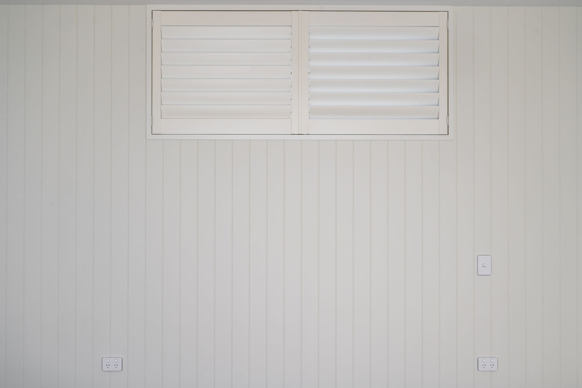 Master Bedroom headboard wall.  Interior Design + Colours: Kelly @ Archi Build Ltd - Wanaka.  Shutters: McKenzie and Willis Wanaka