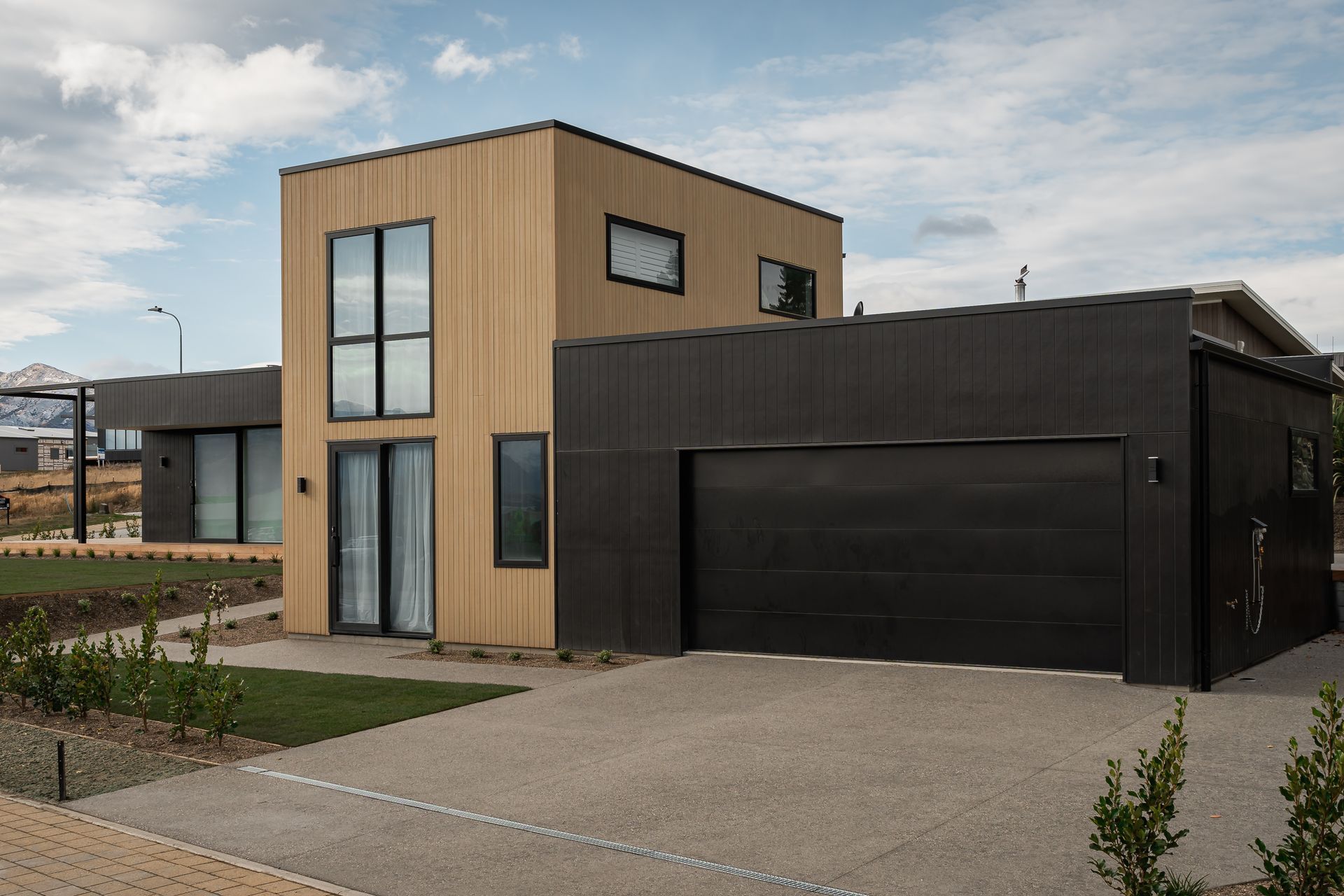 Exterior. Landscaping: Tim Ecroyd 'The Landscaper' - Wanaka.   Interior Design + Colours: Kelly @ Archi Build Ltd - Wanaka.