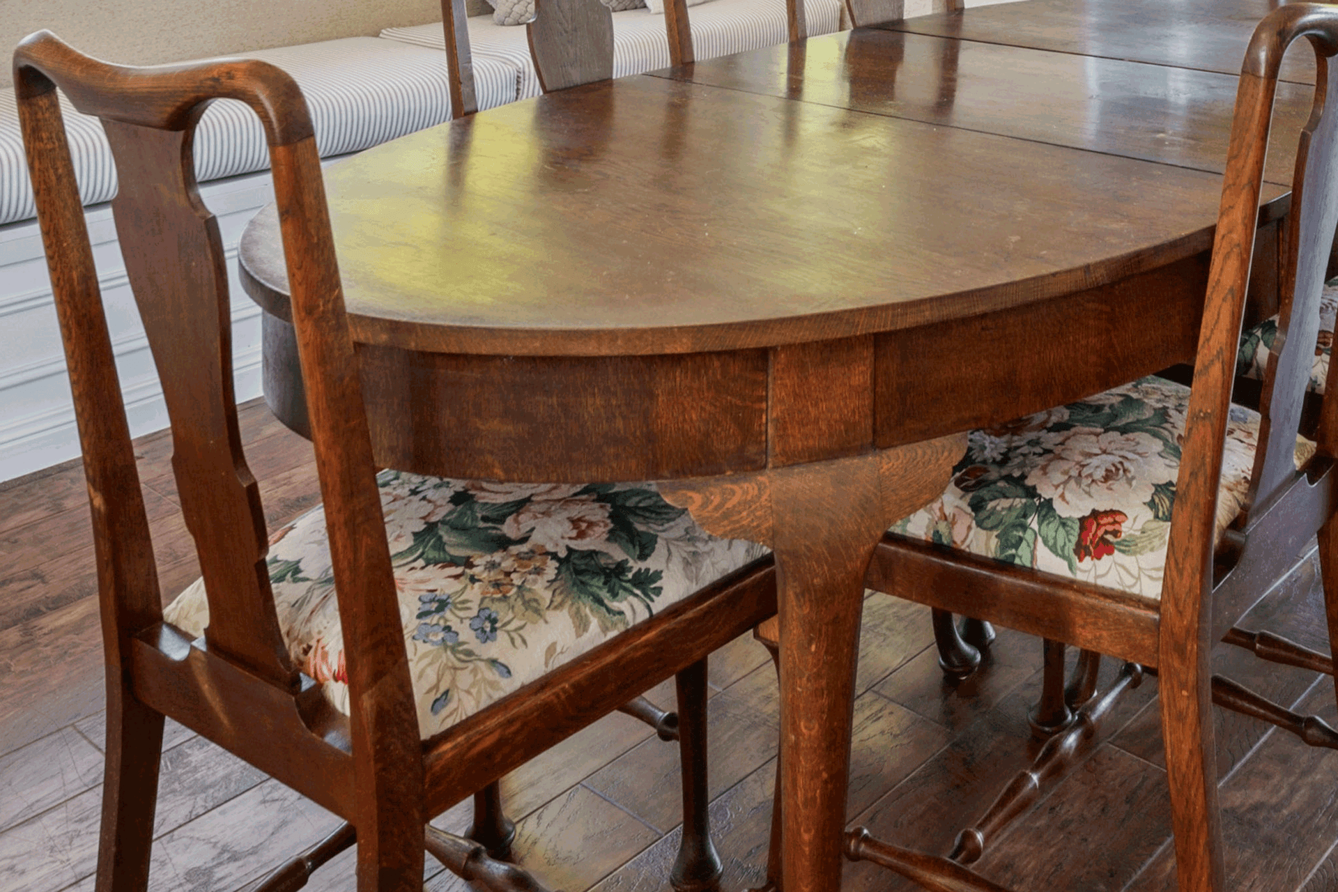 Previous curtain fabric reused on the dining chairs