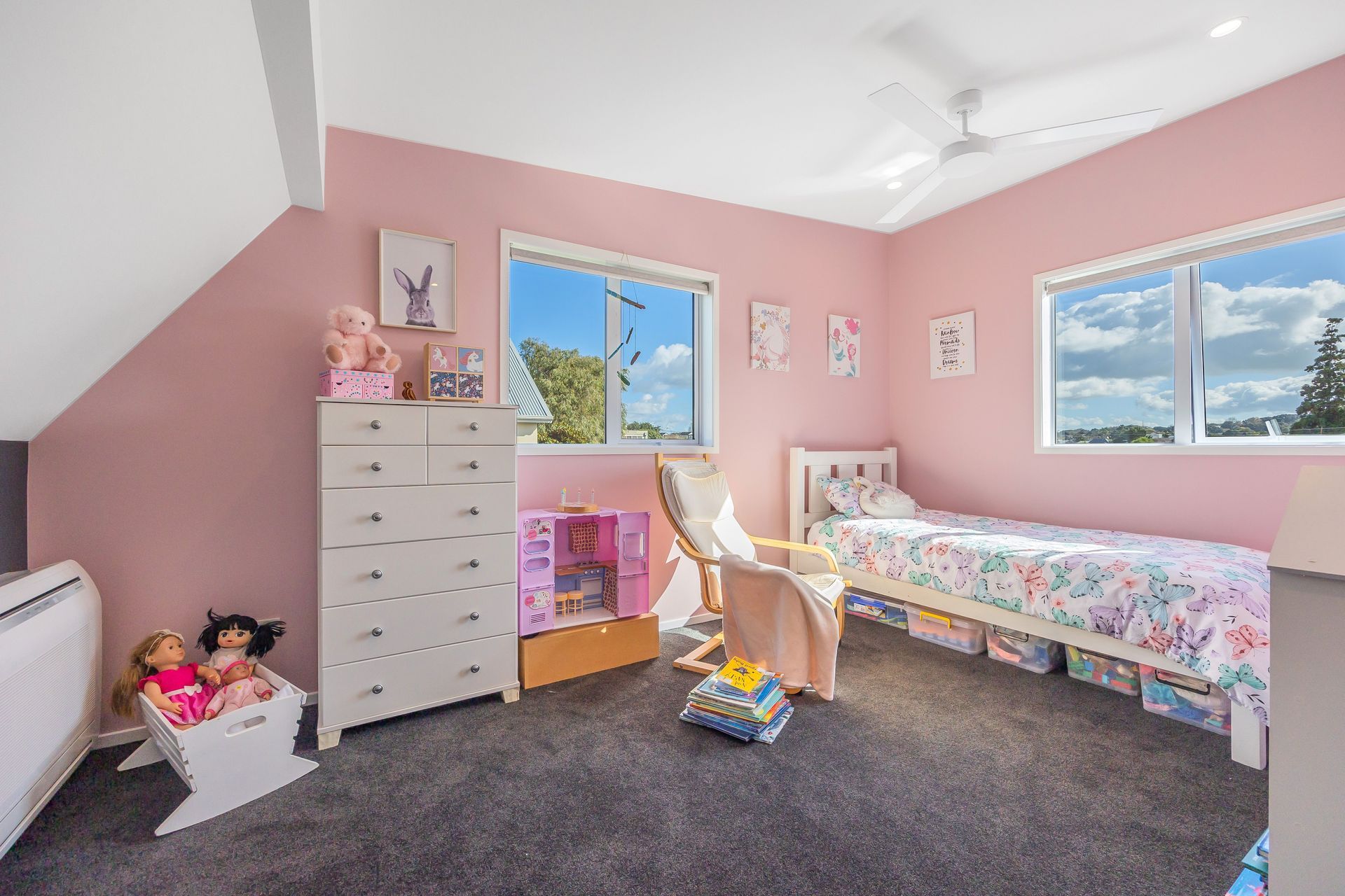 The pink Marshmallow walls create a dreamy and feminine atmosphere, enveloping the room in a soft and comforting hue.