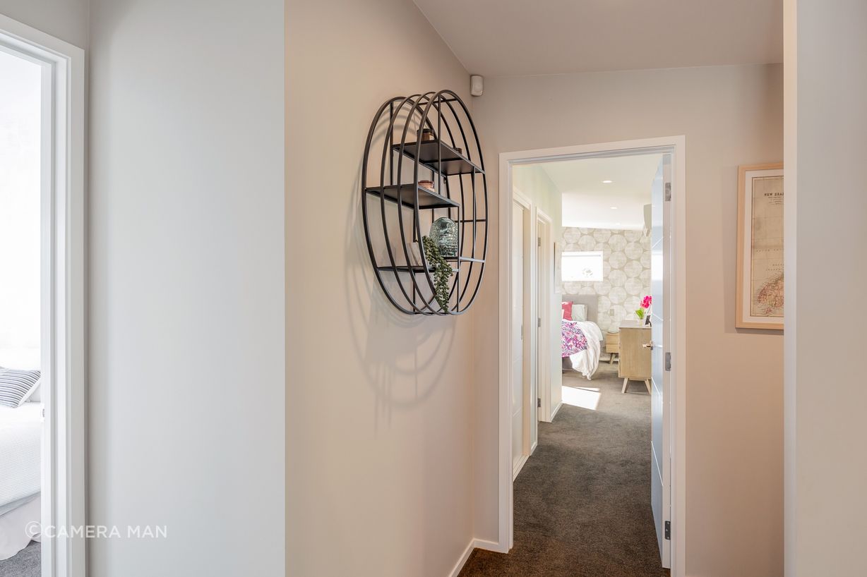 Hallway & Study Nook: Resene Alabaster to ceiling, architraves & skirting; Resene Triple White Pointer to all walls; Feltex Okiwi Bay 020335 Coal Mine 0780 to floor