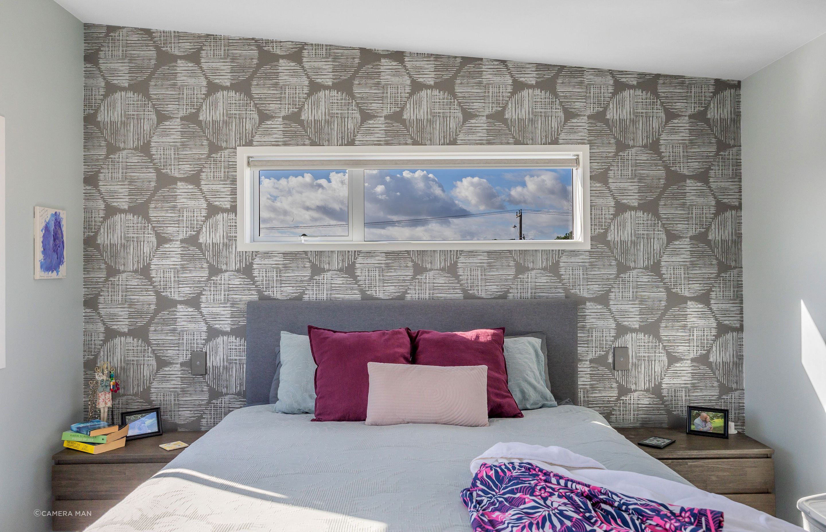 For the master bedroom we choose a color scheme that promotes a calm and relaxing atmosphere. Soft and neutral tones were used and we used the wallpaper to create depth and a focal point. Resene Alabaster to ceiling, architraves & skirting; Resene Half Emerge to all walls apart from feature wall; Aspiring Walls Focus Collection Spots & Stripes Pattern No 30550-1 to feature wall; Feltex Okiwi Bay 020335 Coal Mine 0780 to floor