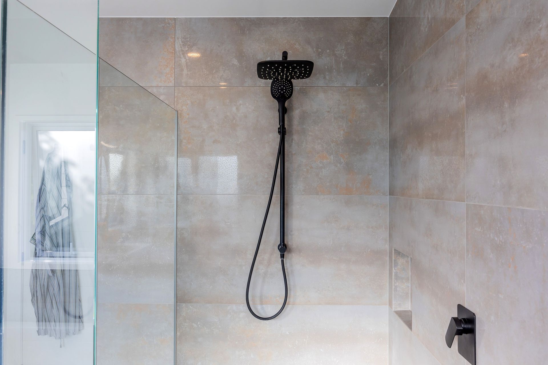 Resene Alabaster to all walls (apart from tiled walls), ceiling, architraves &amp; skirting; Gravity Silver Porcelain Tile 600x1200 Semi-polished to en-suite walls with grout colour Mapei Medium Grey 112 (tile layout: straight stack); Gravity Dark Porcelain Tile 600x1200 Matt to en-suite floor with grout colour: Mapei Medium Grey 112 (tile layout: straight stack)