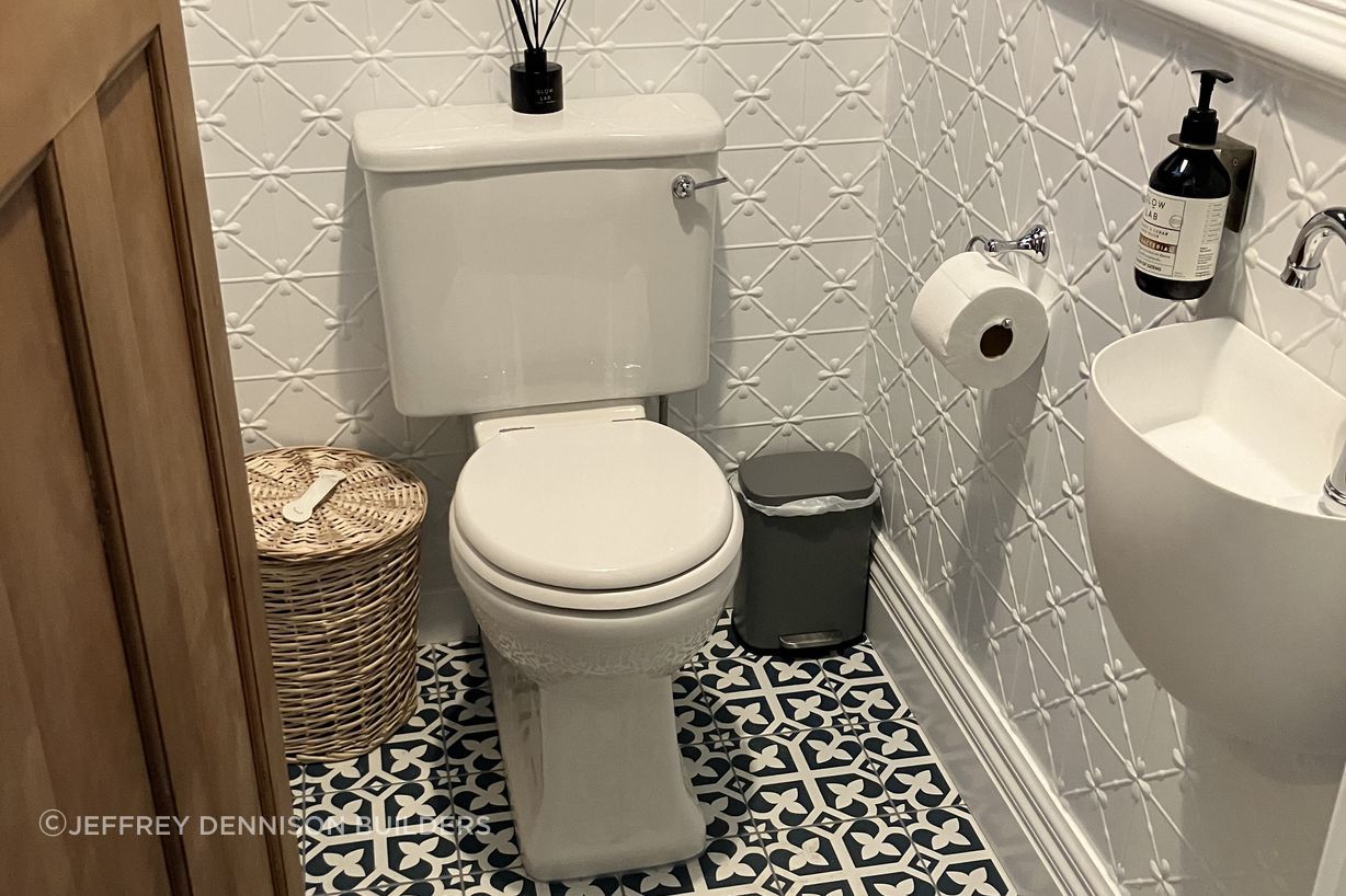 3-426-Herbert-Rd-Herbert-Completed-Power-Room-with-new-toilet-vanity-press-tin-panels-dado-rail-tiles-and-skirting-JDBuilders-v2.jpg