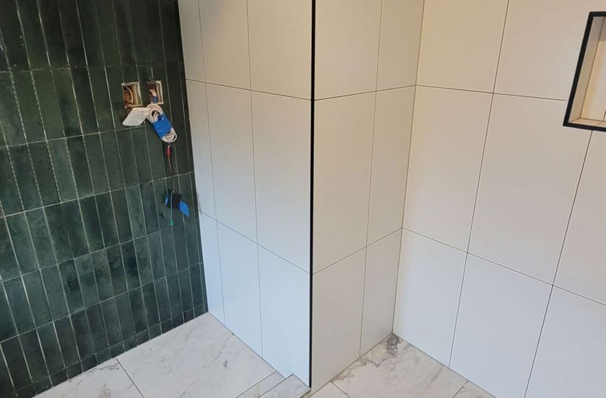 Damn Good Tiling - bathroom feature wall w black trim