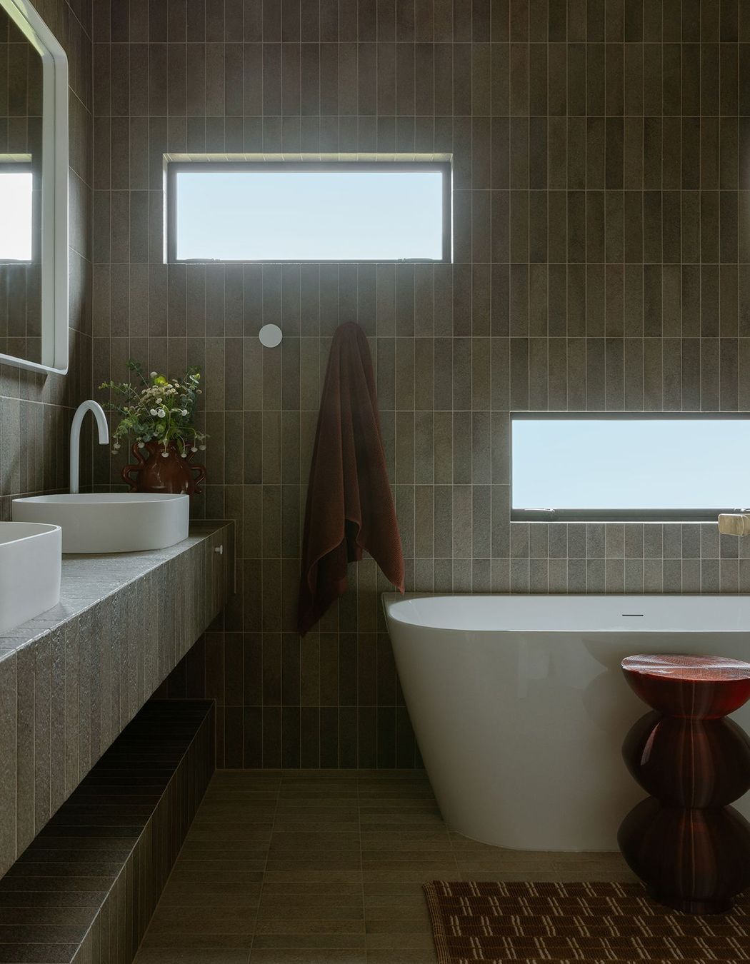 Whananaki Beach Retreat / Alex Walls, Walls Studio / Bathroom. Walls and custom vanity: Fornace Verde Muschio 60x240mm. Floors: Fornace Argilla Naturale 60x240mm