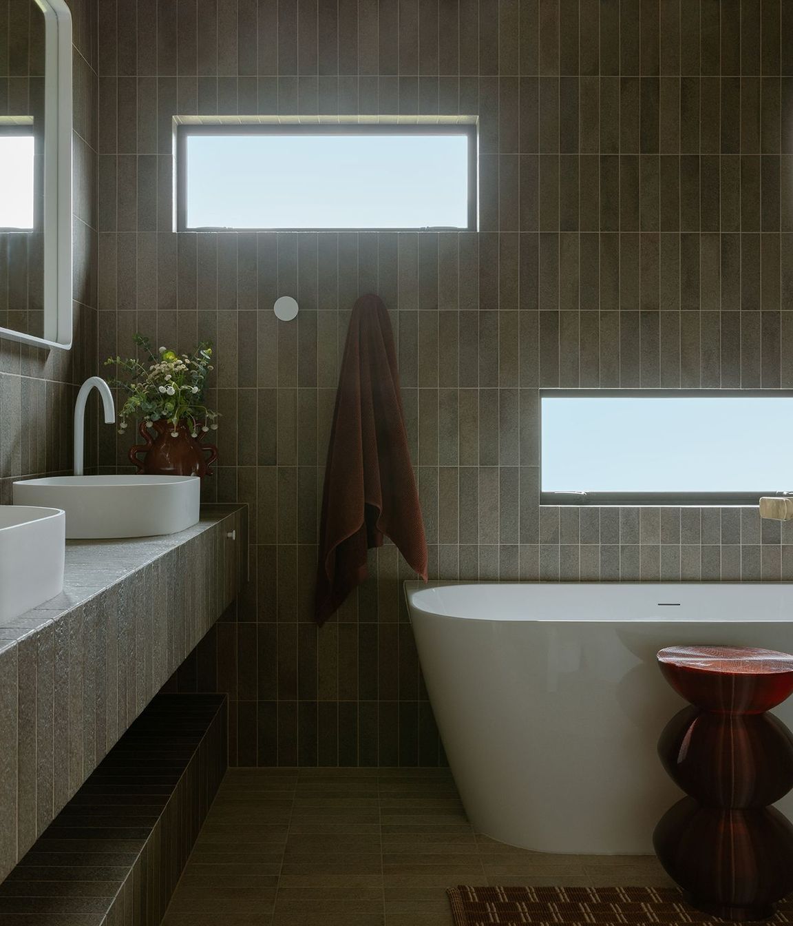 Whananaki Beach Retreat / Alex Walls, Walls Studio / Bathroom. Walls and custom vanity: Fornace Verde Muschio 60x240mm. Floors: Fornace Argilla Naturale 60x240mm