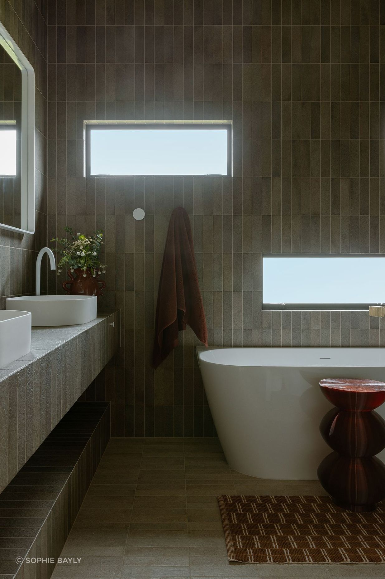 Whananaki Beach Retreat / Alex Walls, Walls Studio / Bathroom. Walls and custom vanity: Fornace Verde Muschio 60x240mm. Floors: Fornace Argilla Naturale 60x240mm