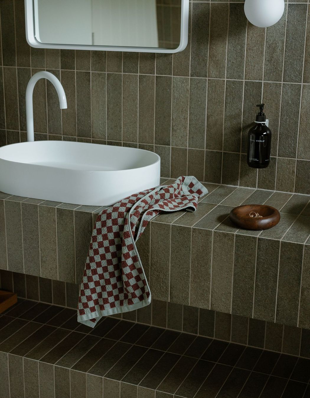 Whananaki Beach Retreat / Alex Walls, Walls Studio / Bathroom. Walls and custom vanity: Fornace Verde Muschio 60x240mm. Floors: Fornace Argilla Naturale 60x240mm