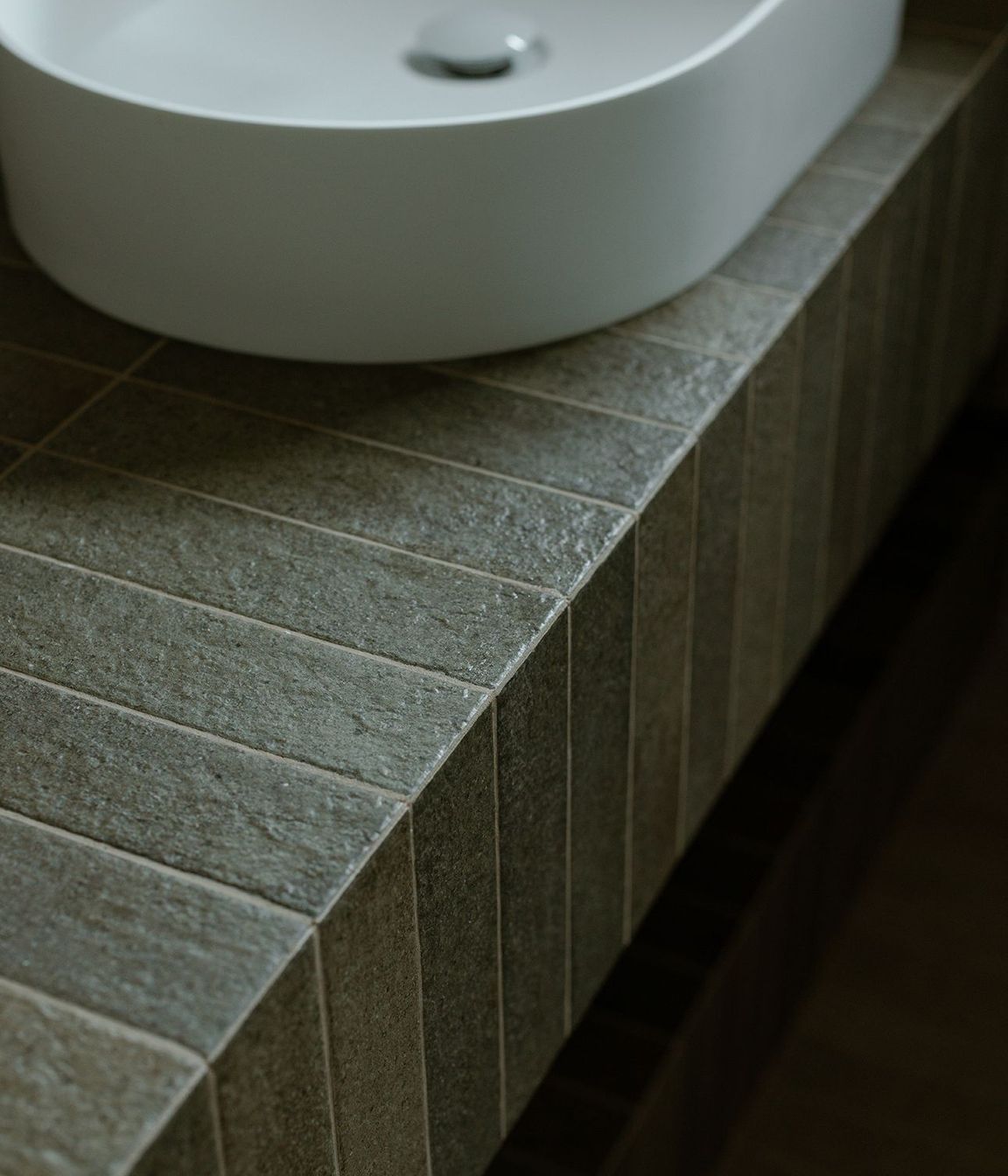Whananaki Beach Retreat / Alex Walls, Walls Studio / Bathroom. Custom vanity: Fornace Verde Muschio 60x240mm.
