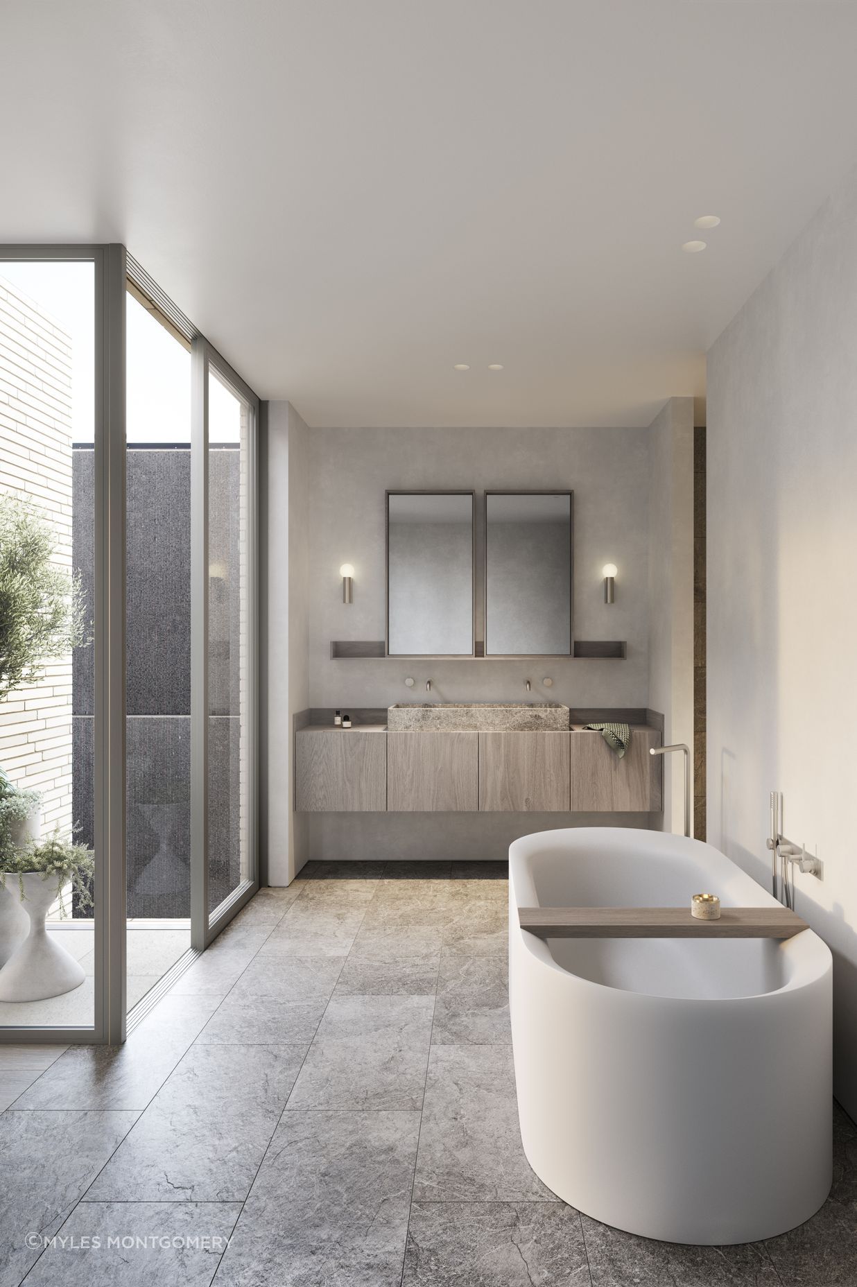 Tumbled marble tiles and carved stone basins imbue bathrooms with an elegant tactility.
