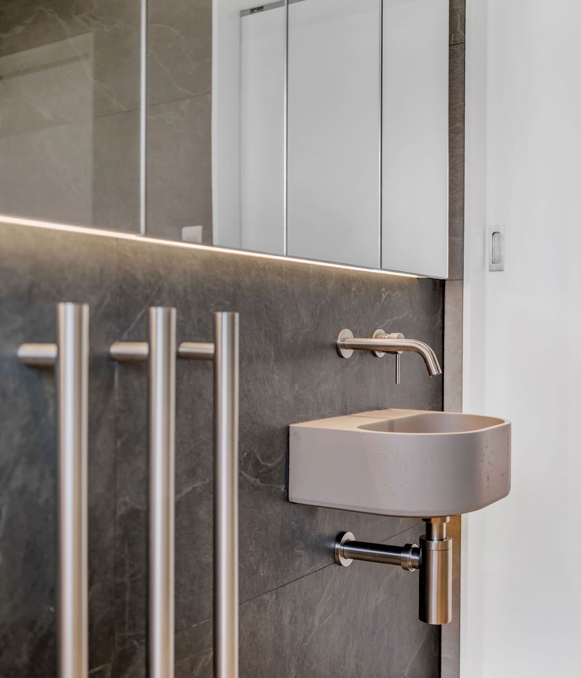 Backlit and beautifully integrated, this one’s designed to glow, not glare.