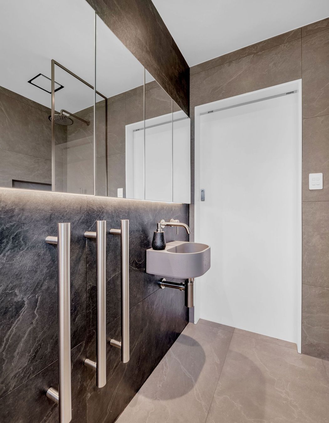 From grout lines to tapware placement, every millimetre is intentional.