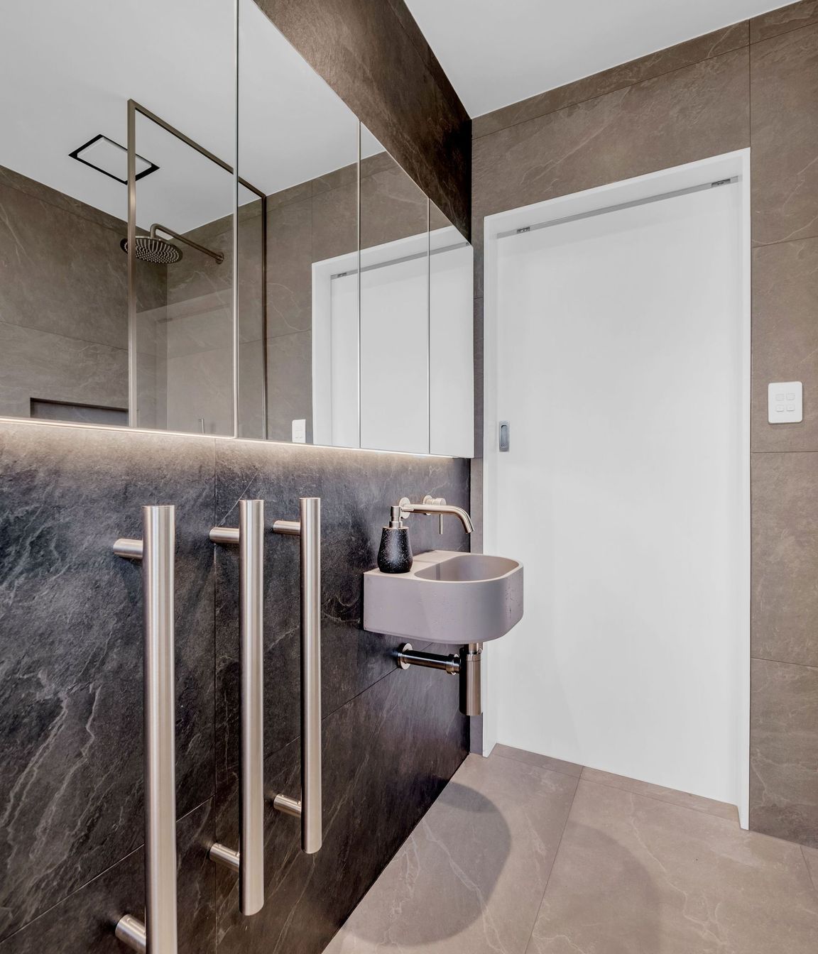 From grout lines to tapware placement, every millimetre is intentional.