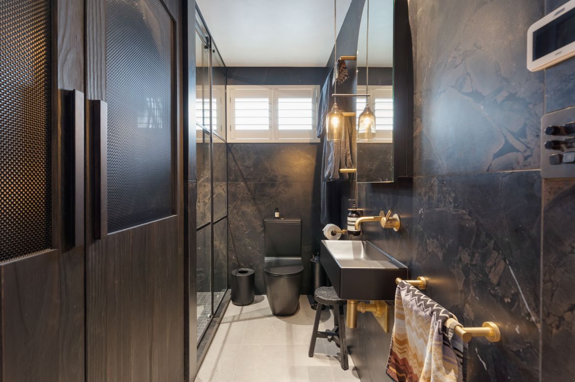 Opulent Retreat | A Guest Bathroom and Laundry with a Redefined Experience