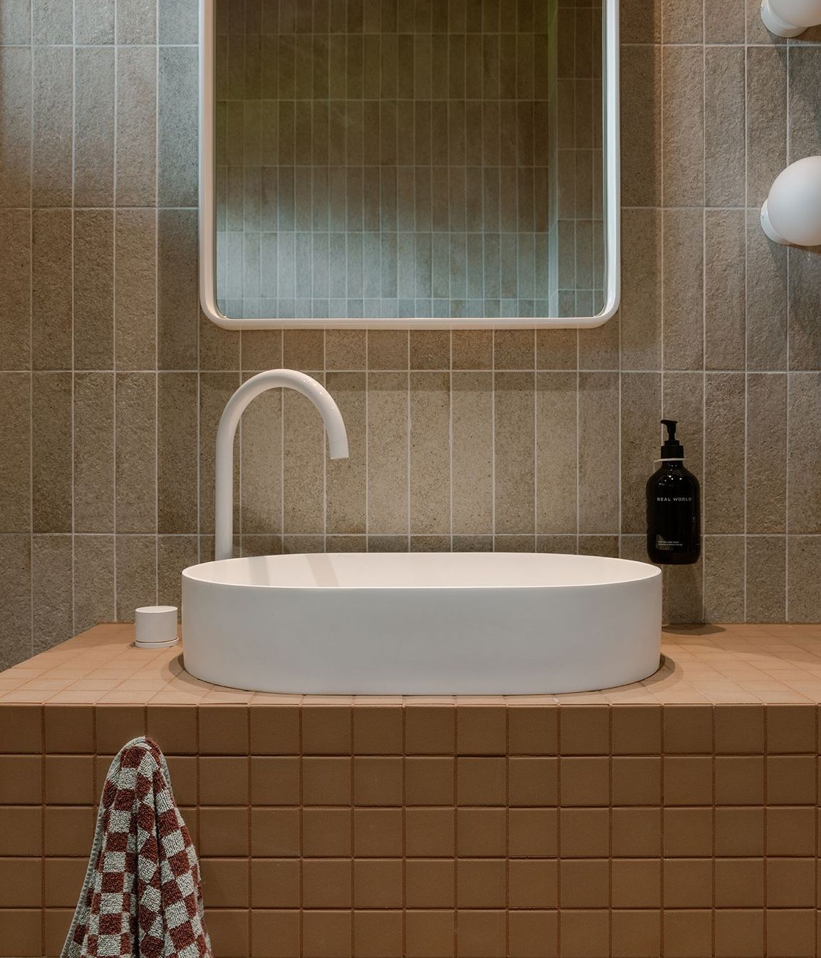 Whananaki Beach Retreat / Alex Walls, Walls Studio / Ensuite Walls: Fornace Argilla Naturale 60x240mm Custom Vanity and floor : Terra Cappi Mosaic