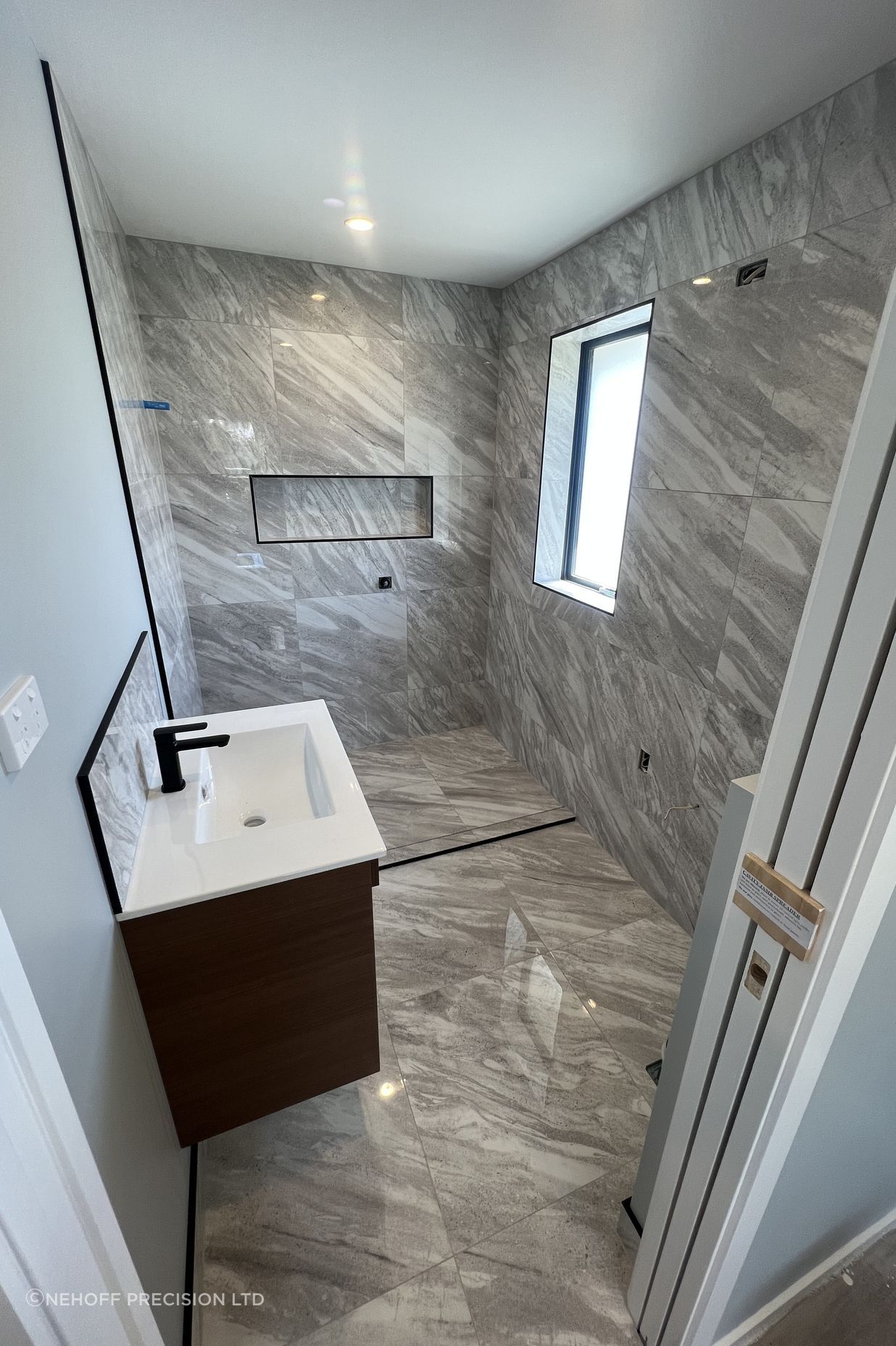 Tiled bathroom floor &amp; shower walls