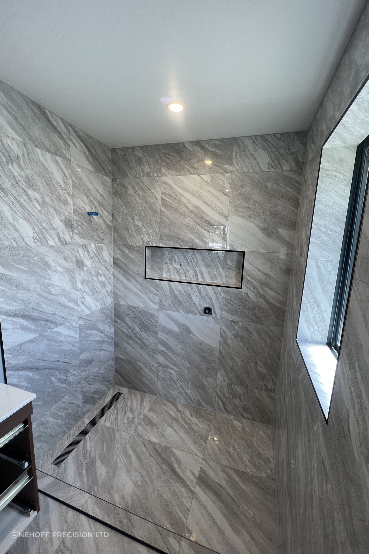 Tiled bathroom floor &amp; shower walls