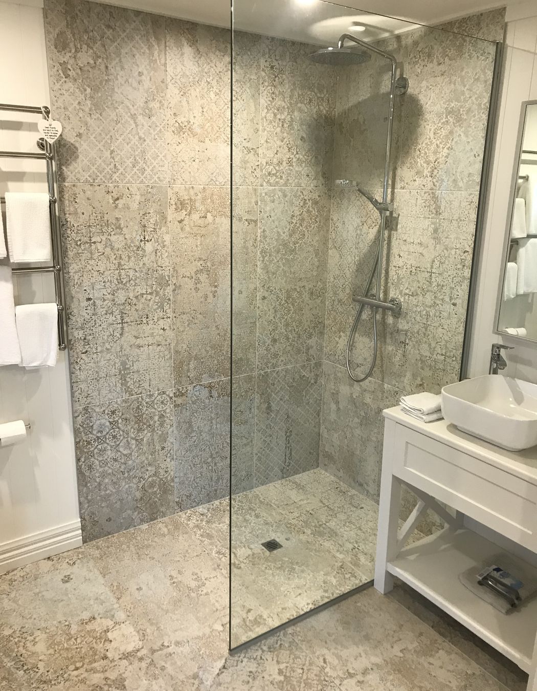 Tiled bathroom floor & shower walls
