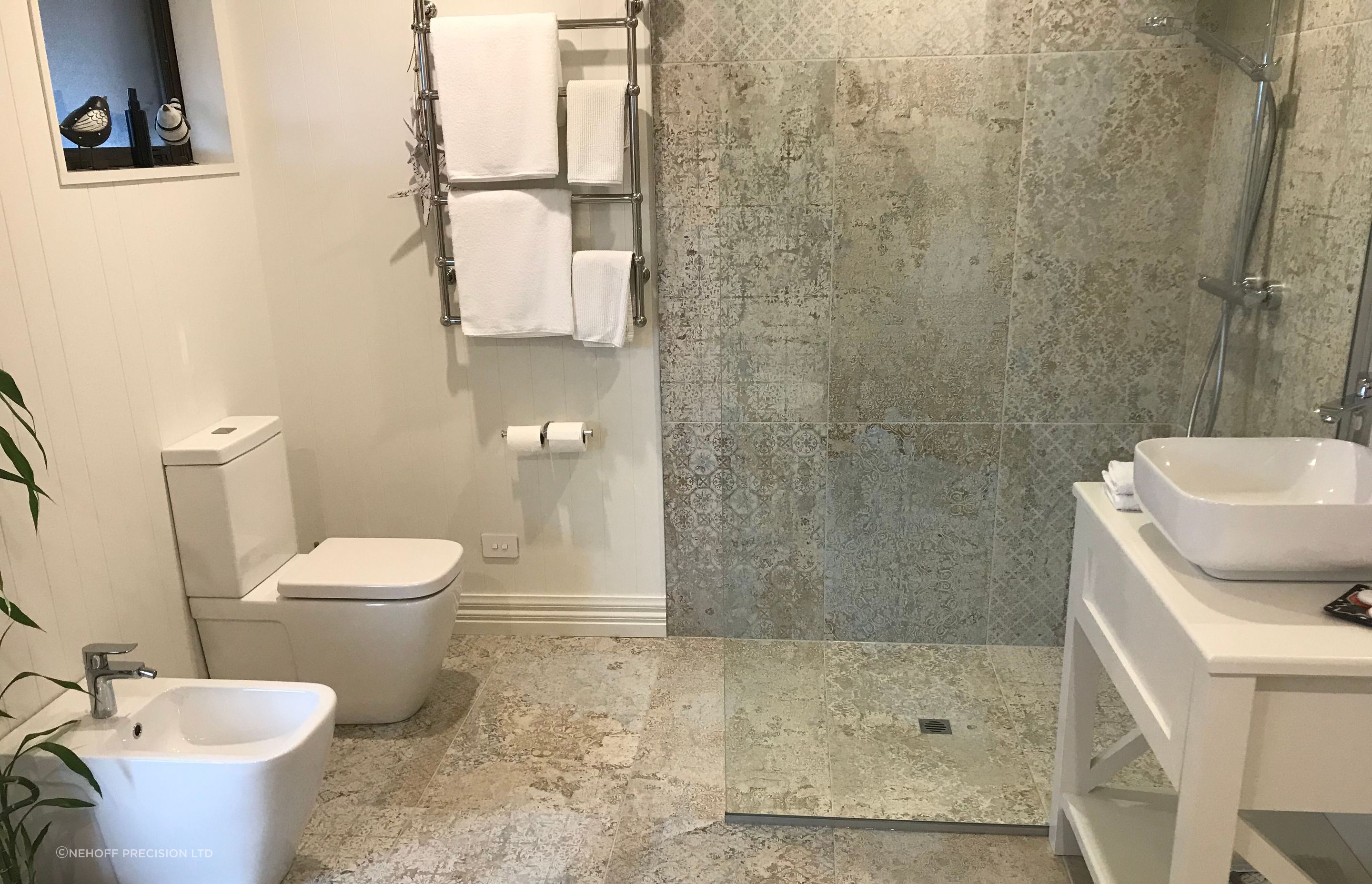 Tiled bathroom floor &amp; shower walls