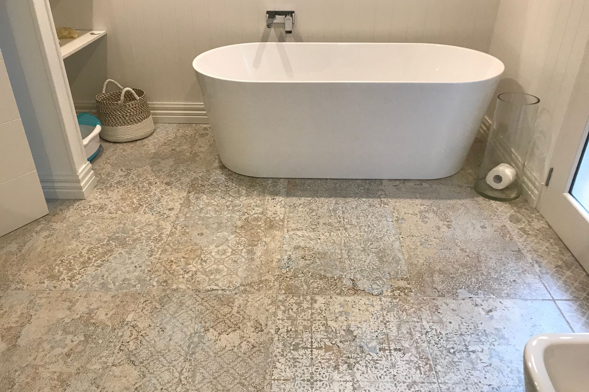 Tiled bathroom floor.