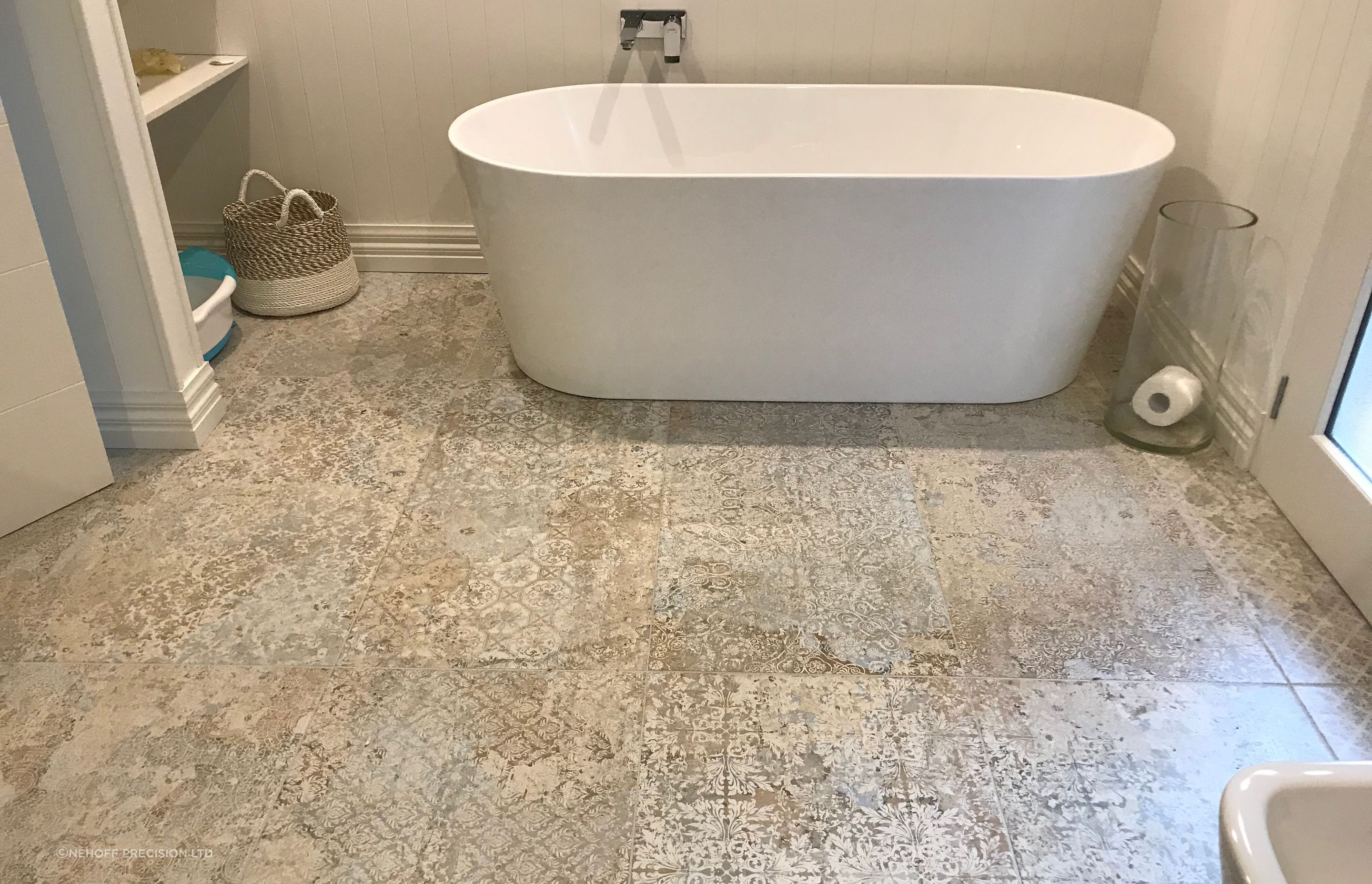 Tiled bathroom floor.