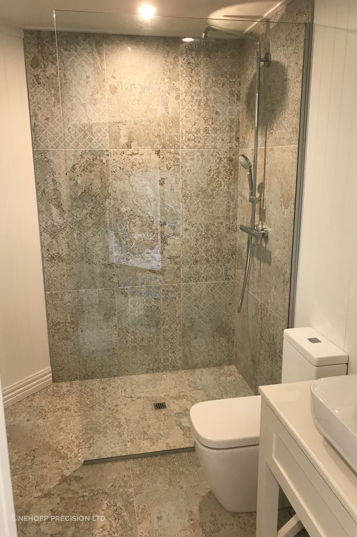 Tiled bathroom floor &amp; shower walls