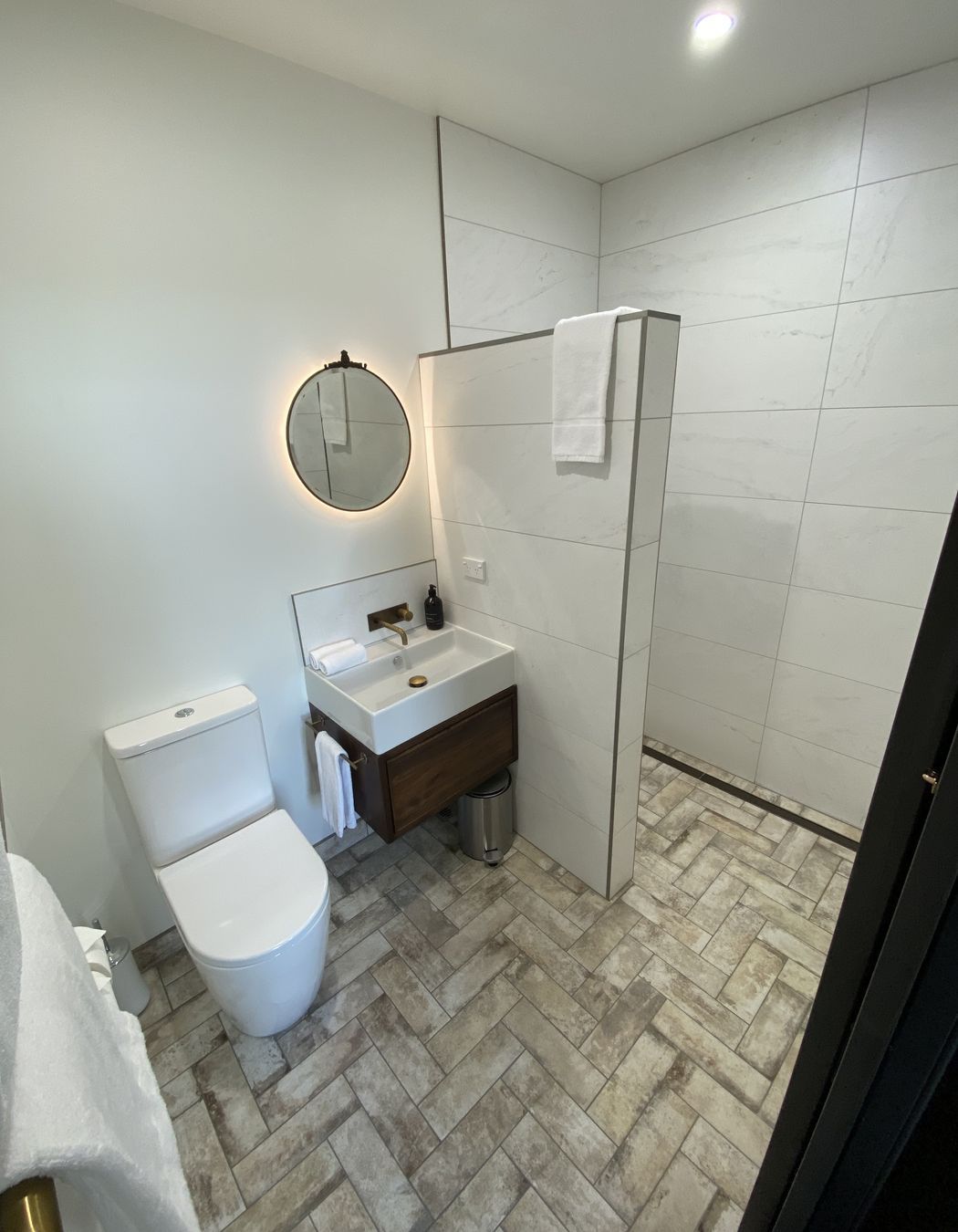 Tiled bathroom floor & shower walls