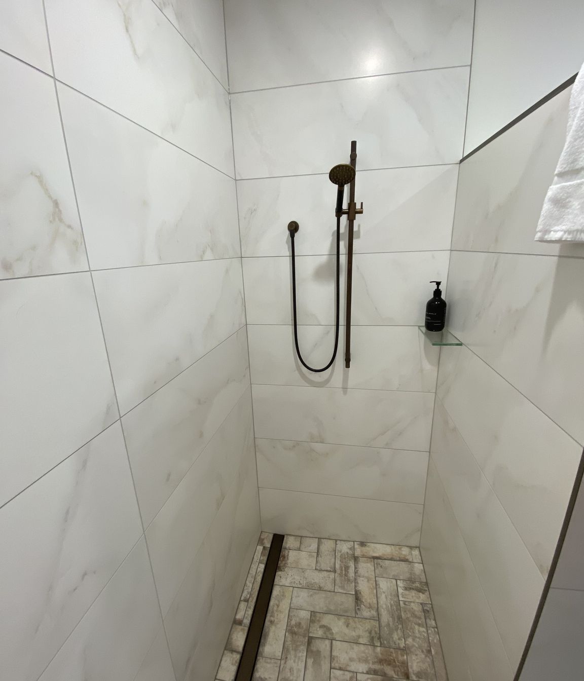 Tiled bathroom floor &amp; shower walls