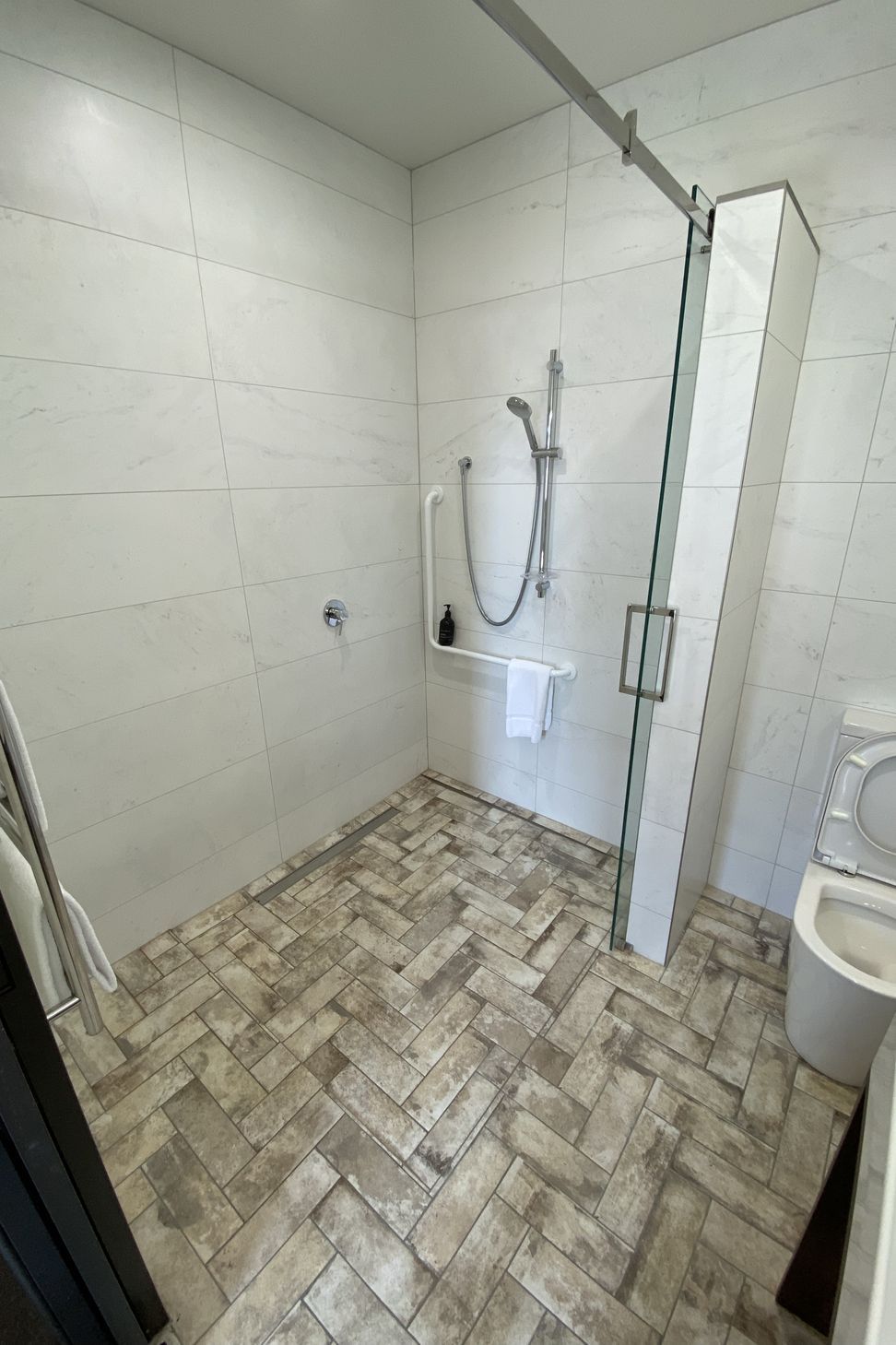 Tiled bathroom floor &amp; shower walls