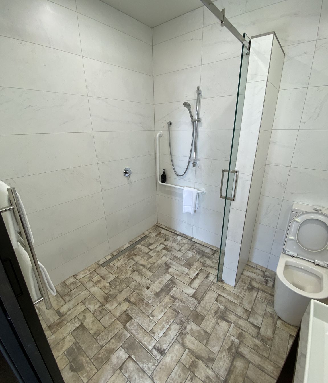 Tiled bathroom floor &amp; shower walls