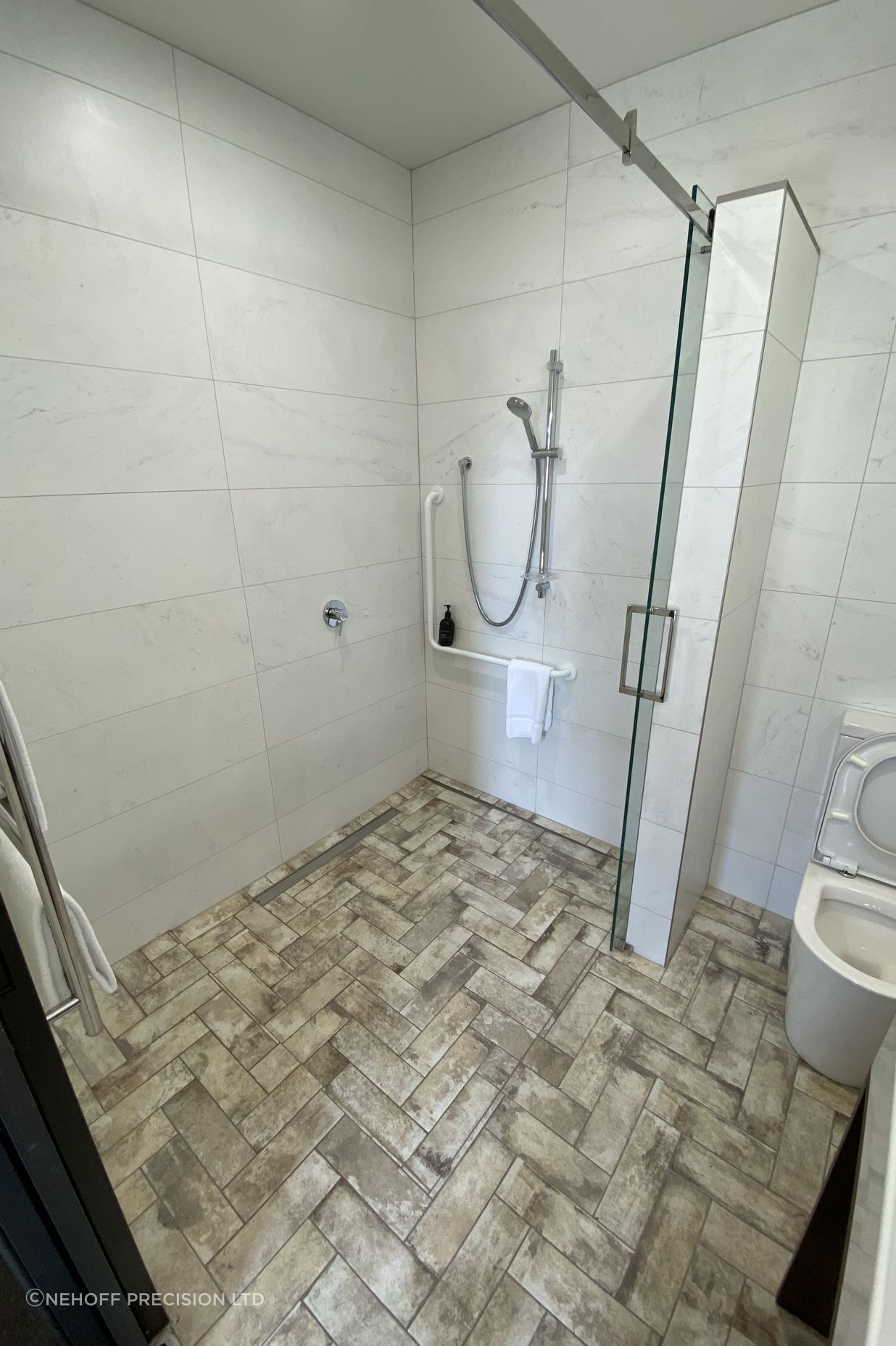 Tiled bathroom floor &amp; shower walls
