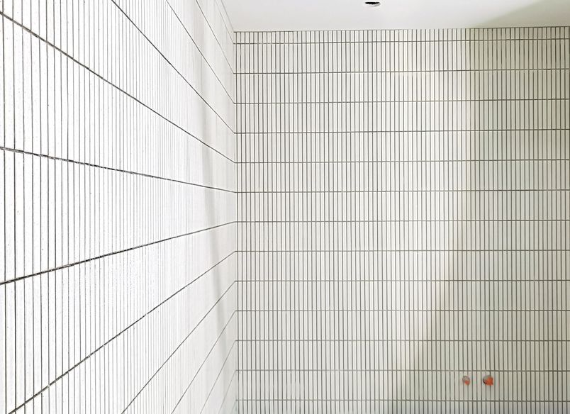 Damn Good Tiling - finger mosaic wall