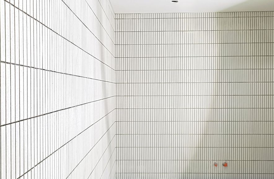 Damn Good Tiling - finger mosaic wall