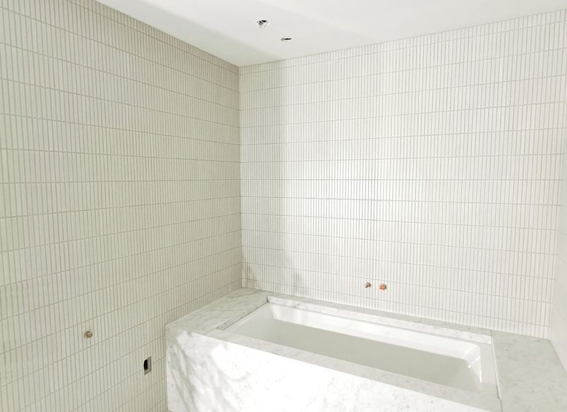 Damn Good Tiling - finger mosaic wall