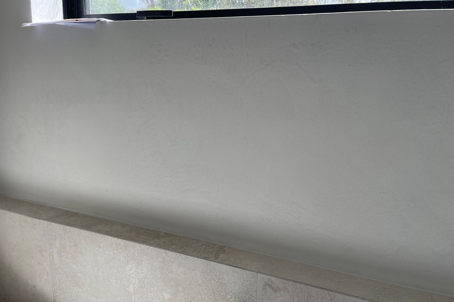 Yeso Resistone microcement seamless bathroom