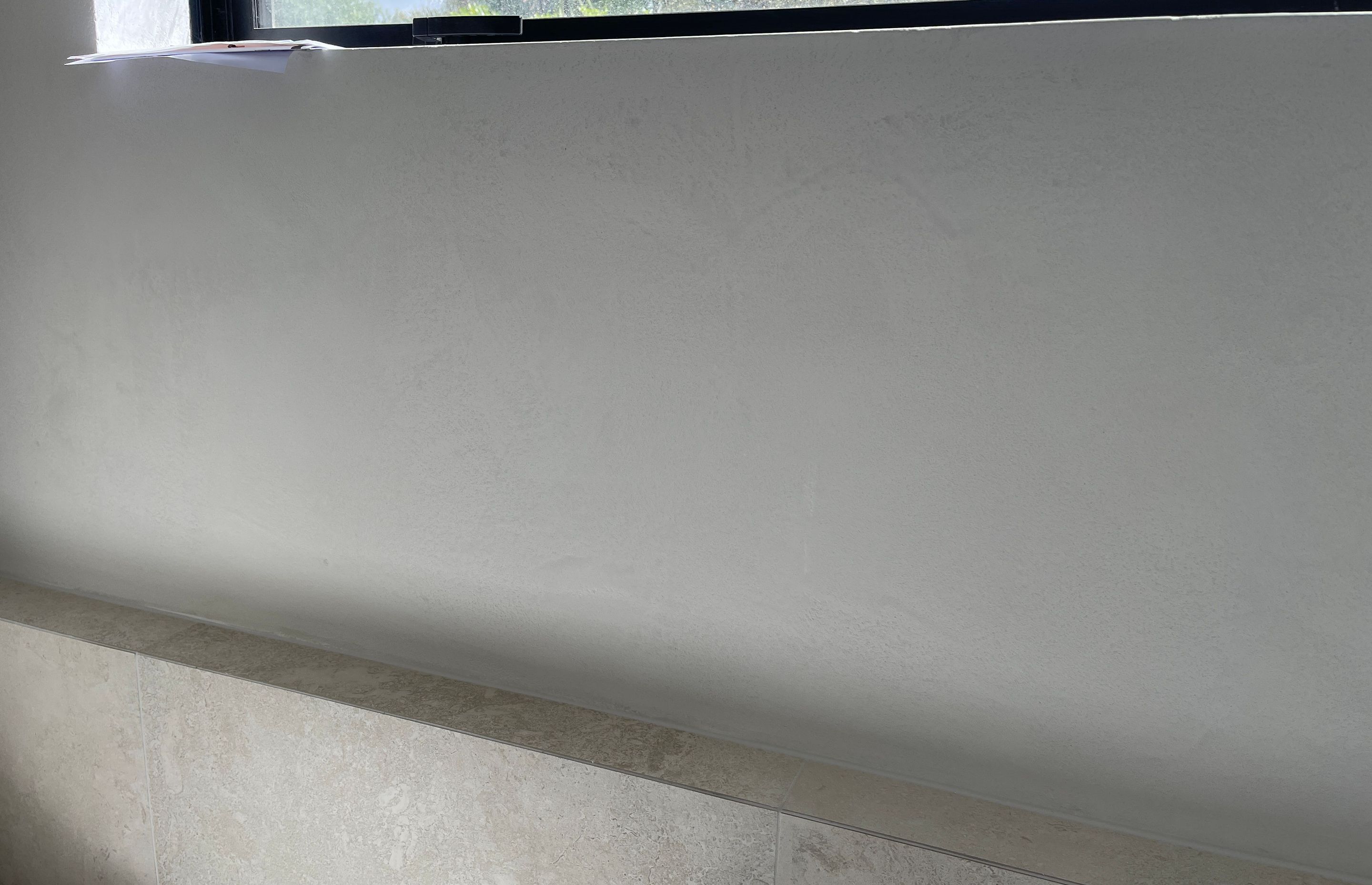 Yeso Resistone microcement seamless bathroom