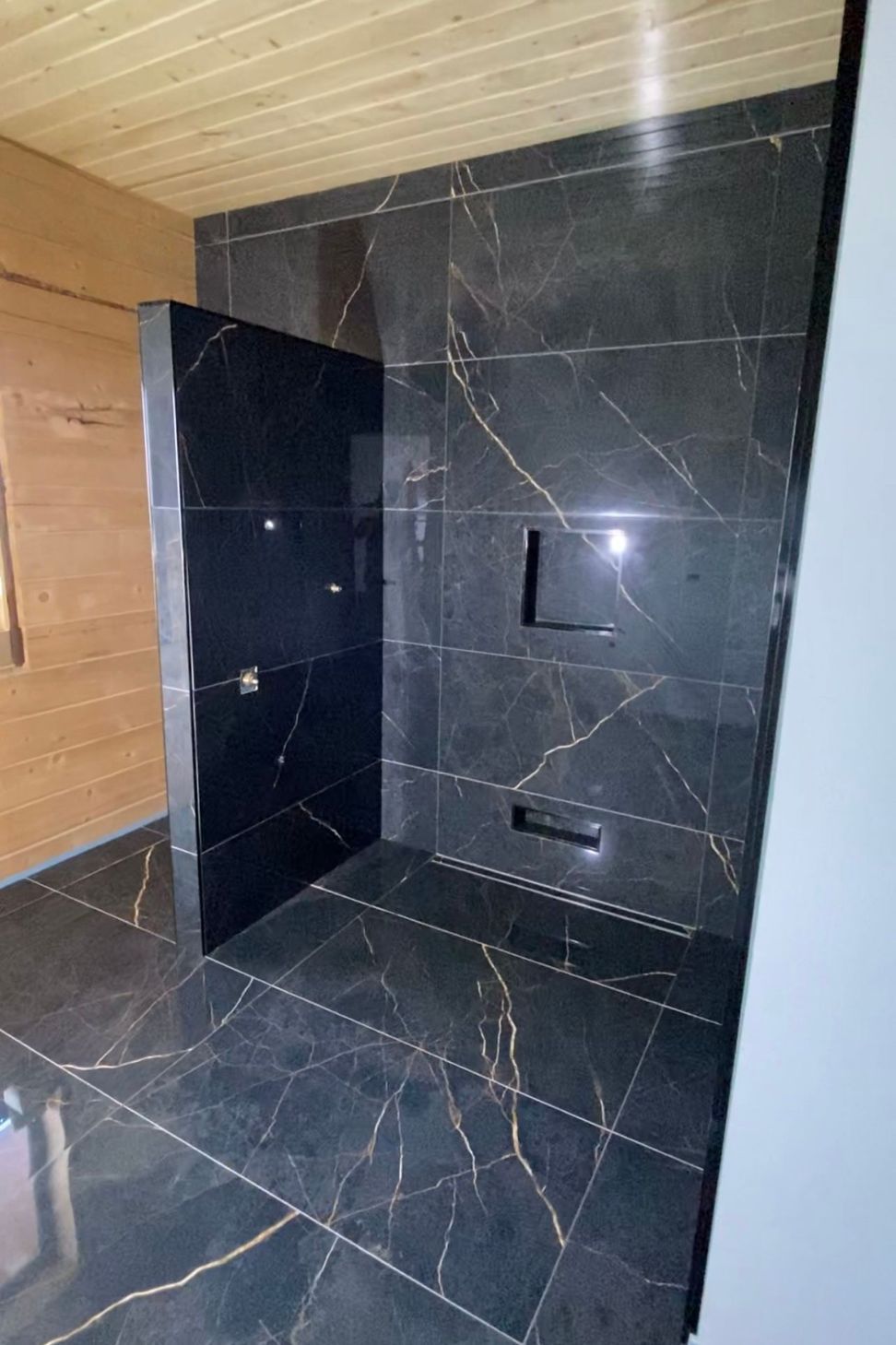 Tiled bathroom floor &amp; shower walls